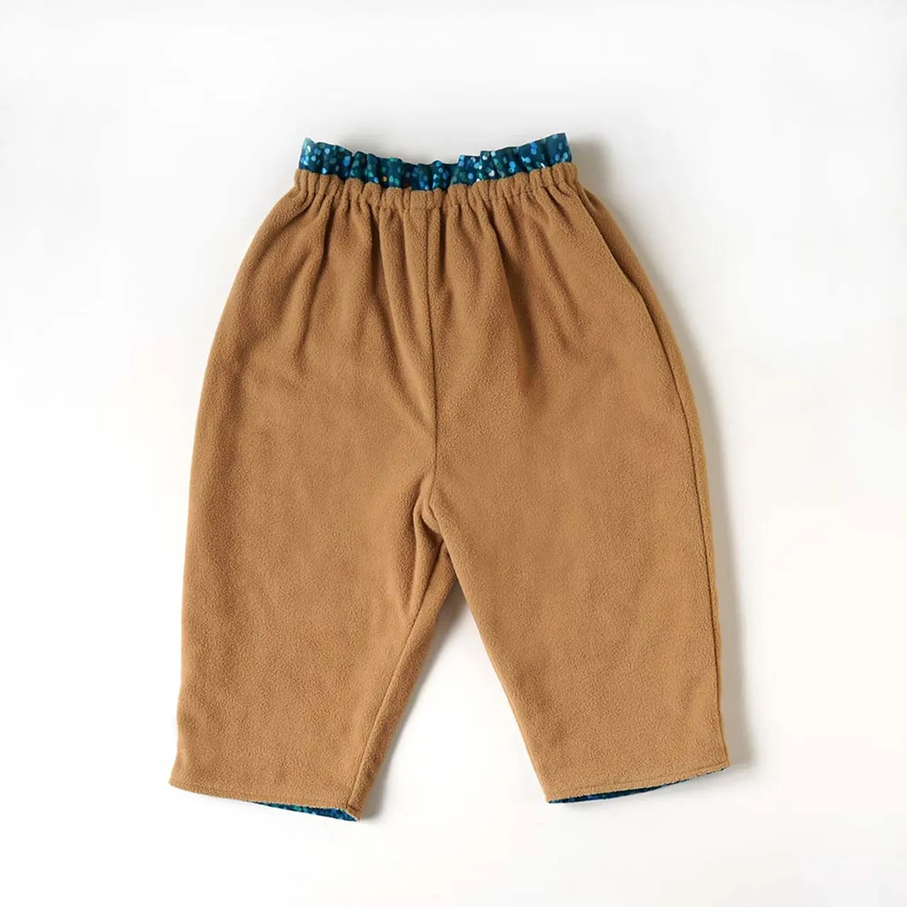 Hoppetta NAOMI ITO reversible fleece pants green